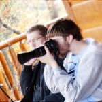Family photographing foliage